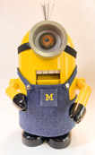 Chuck Bajnai - Michigan Minion, Poplar with Acrylic Paint, Linkage inside the head causes the mouth to open when arms are moved.